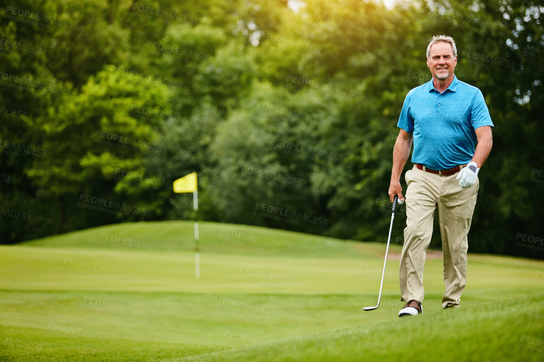 Buy stock photo Mature man, portrait and happy at golf course with hobby or activity for retirement and fun. Confident, smile and playing at field or club for fitness, training and exercise for health and recreation