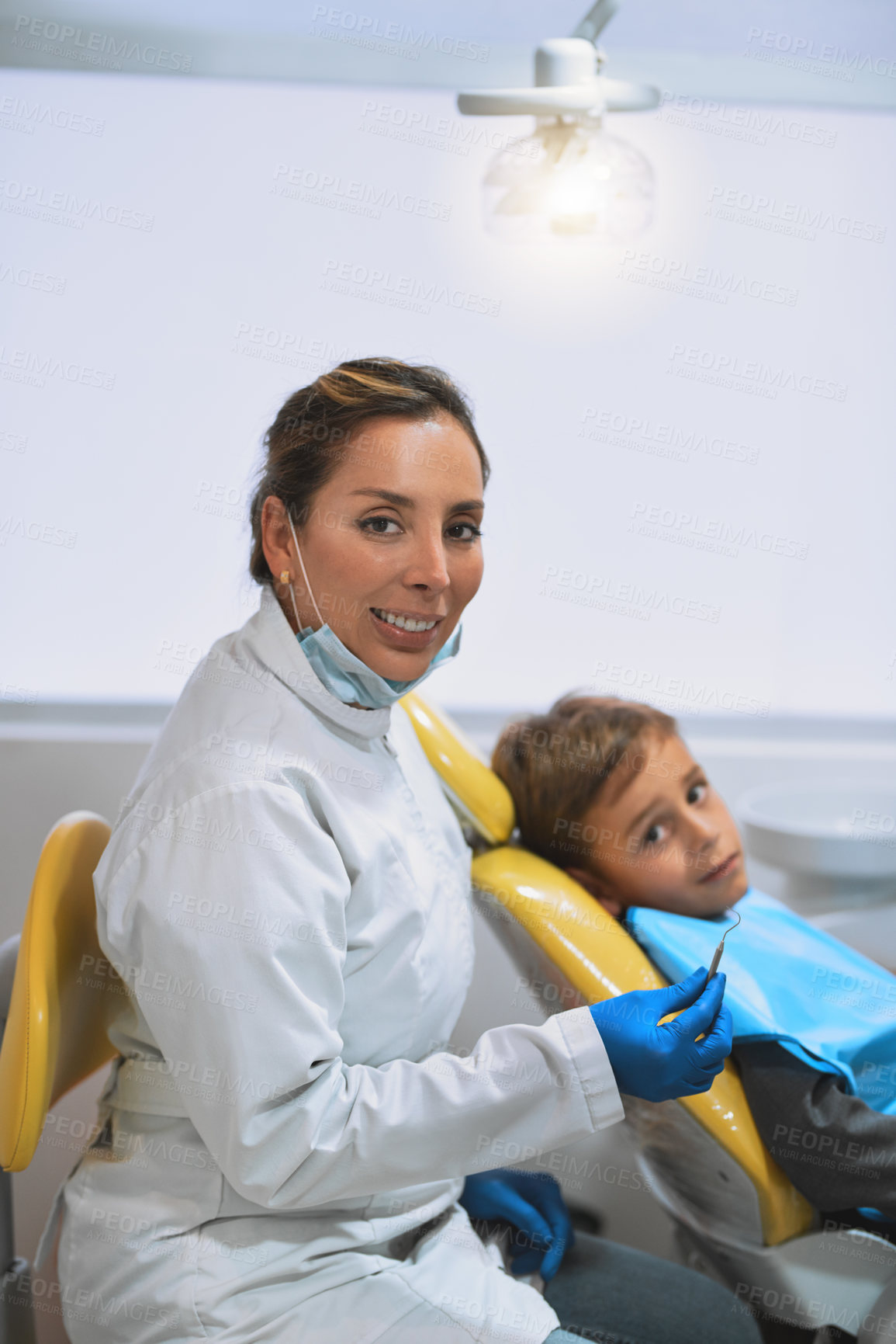 Buy stock photo Happy dentist, kid and patient with portrait for tooth extraction, dental hygiene and cleaning service. Healthcare, dentistry and boy for checkup, oral care and smile with excavator in consultation