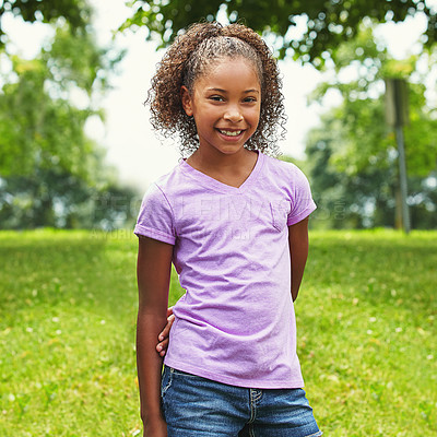 Buy stock photo Shot of a young girl enjoying a day in the park