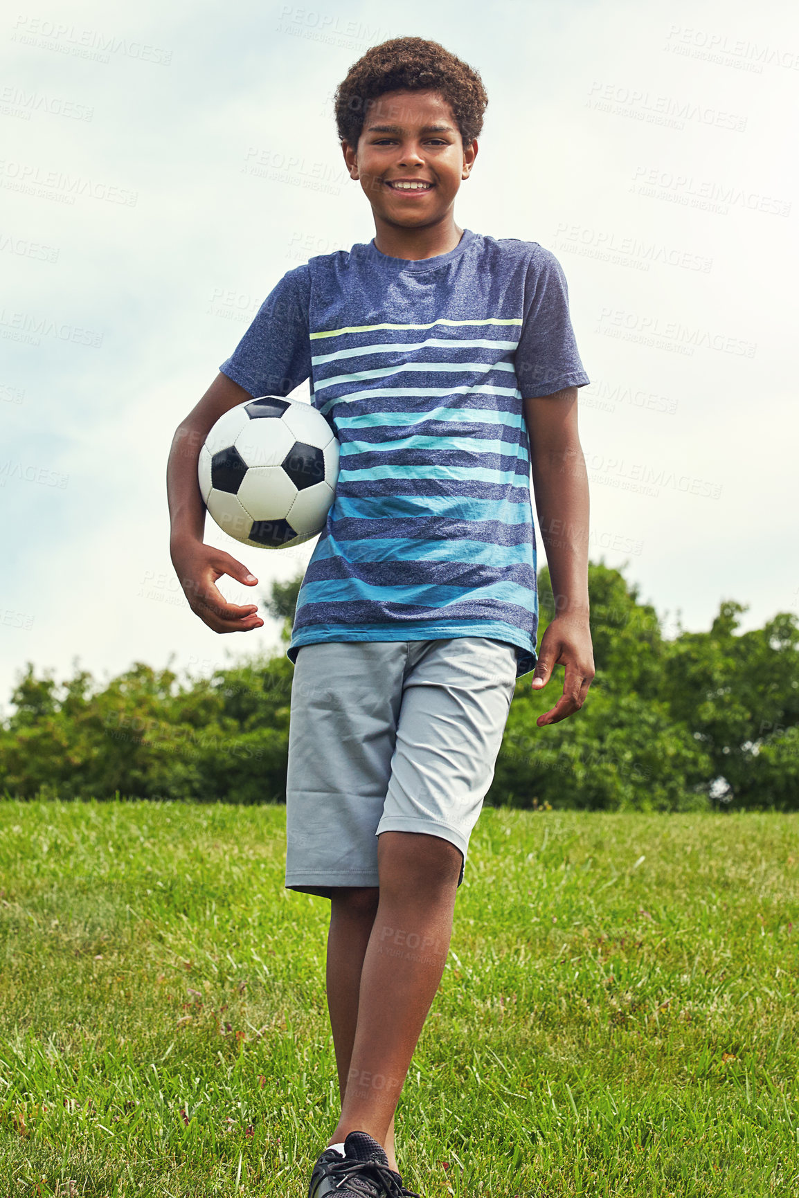 Buy stock photo Outdoor, portrait and boy with soccer ball in park for childhood development, freedom or hobby. Nature, sports and Brazilian kid with smile in playground for happiness, playing or football game