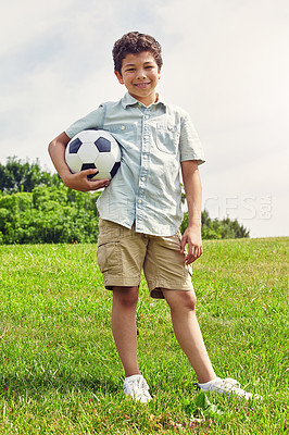 Buy stock photo Outdoor, portrait and boy with soccer ball in playground for childhood development, summer or hobby. Nature, sports and Brazilian kid with smile in park for happiness, playing or football game