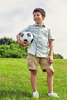 Buy stock photo Nature, thinking and boy child with soccer ball in field for childhood development, idea or hobby. Outdoor, sports and kid with smile in playground for happiness, youth and football game in Canada