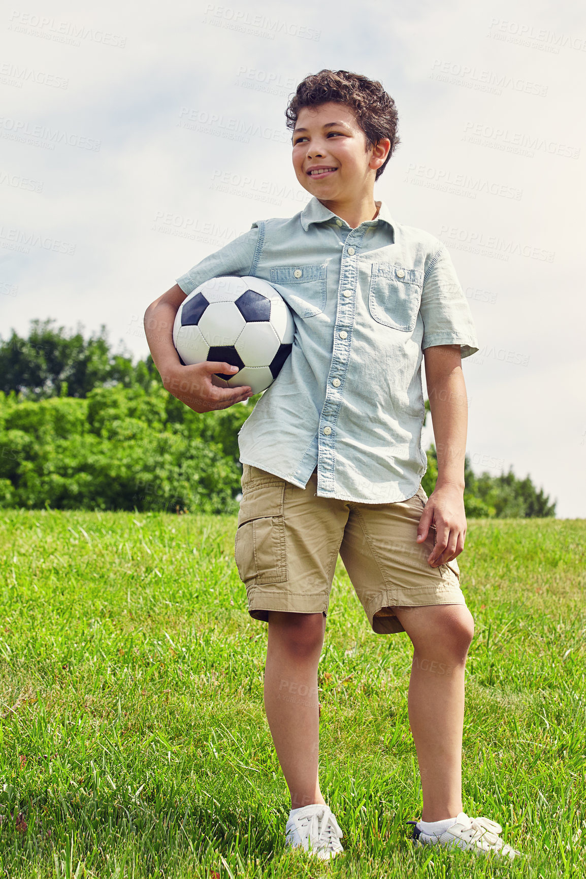 Buy stock photo Nature, thinking and boy child with soccer ball in field for childhood development, idea or hobby. Outdoor, sports and kid with smile in playground for happiness, youth and football game in Canada