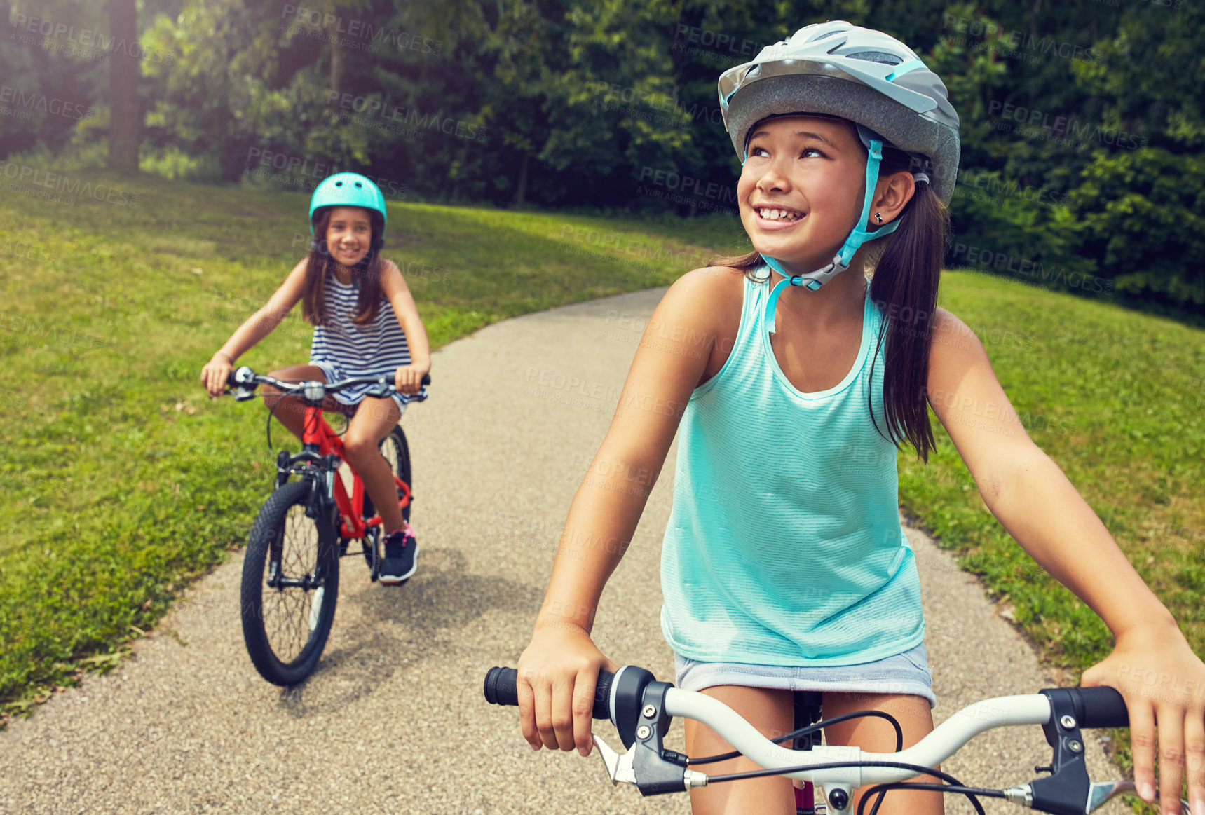 Buy stock photo Outdoor, nature and children with bicycle for riding, learning and playing together with helmet for safety. Park, path and  happy girls for cycling, bike activity and coordination with balance