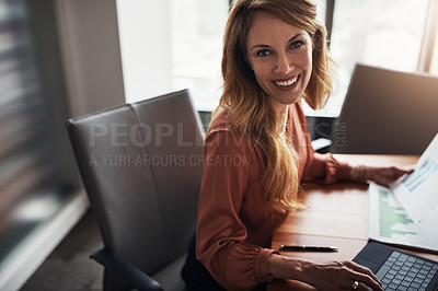 Buy stock photo High angle portrait of an attractive businesswoman working in her corporate office