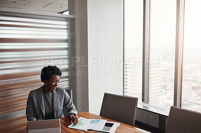 Buy stock photo High angle shot of an attractive businesswoman working in her corporate office