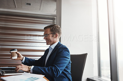 Buy stock photo Cropped shot of a handsome businessman working in his corporate office