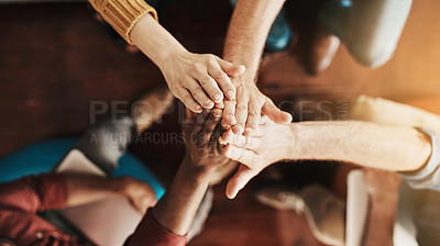 Buy stock photo High angle shot of a group of unrecognizable businesspeople high fiving together