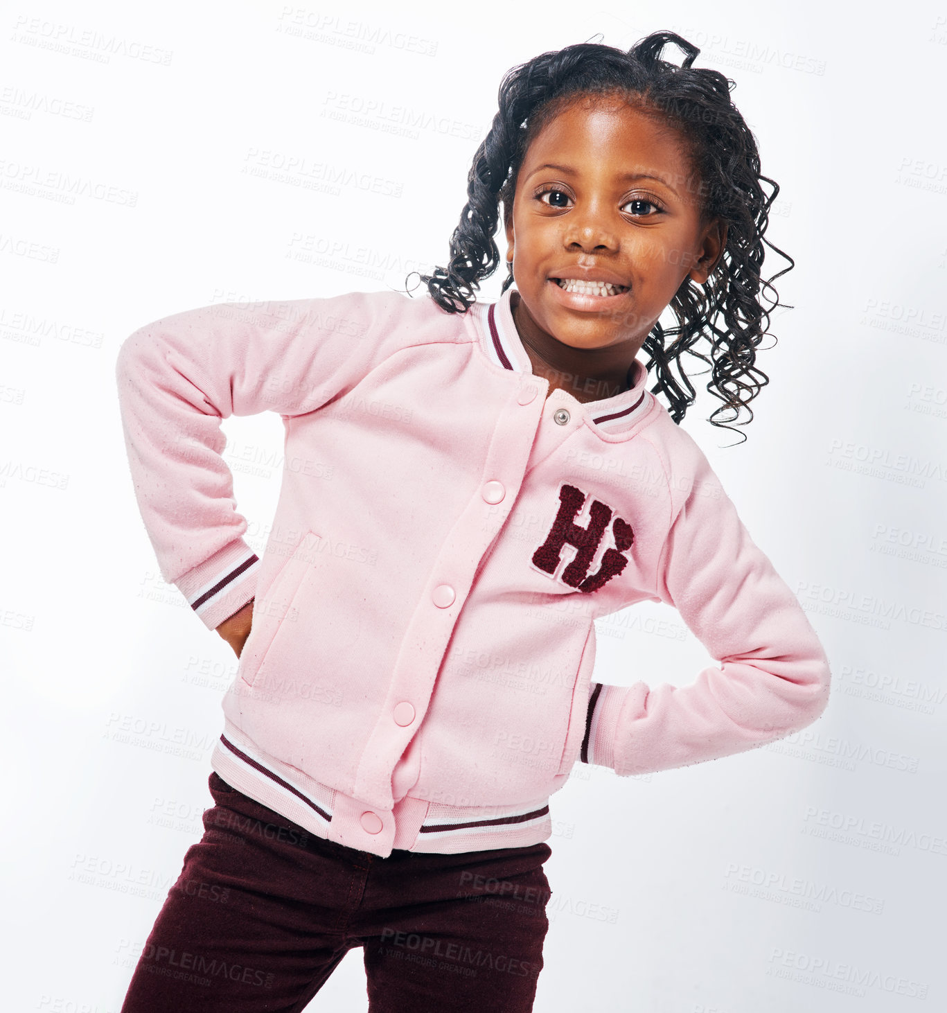 Buy stock photo Cropped shot of an adorable little girl posing against a white background