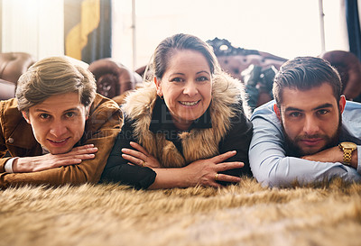 Buy stock photo Mature mom, son and happy on portrait on floor on visit for bonding, love and support in Spain. People, parent and smile as family in living room on break with laughing, relax and trust at home