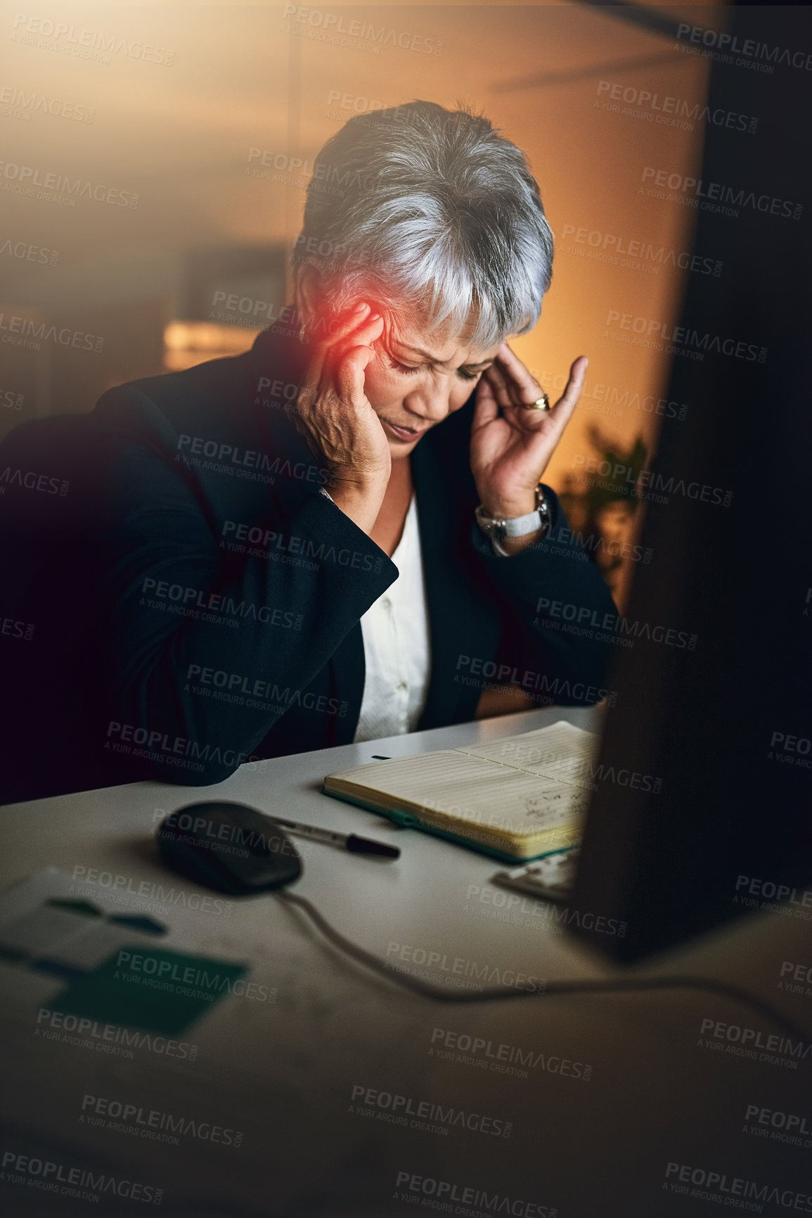 Buy stock photo Mature woman, headache and stress in office by computer with notes, pain and red glow with glitch at night. Person, tired and fatigue with migraine, exhausted and massage by pc at financial agency