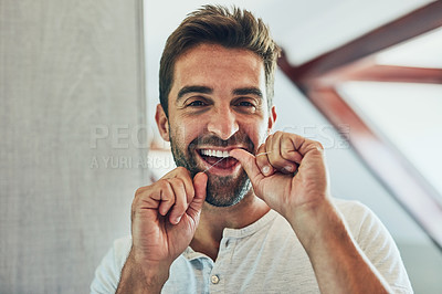 Buy stock photo Dental floss, portrait and teeth with man in bathroom mirror for cleaning, morning routine and oral hygiene. Smile, cosmetics and health with person flossing at home for self care, breath and mouth 