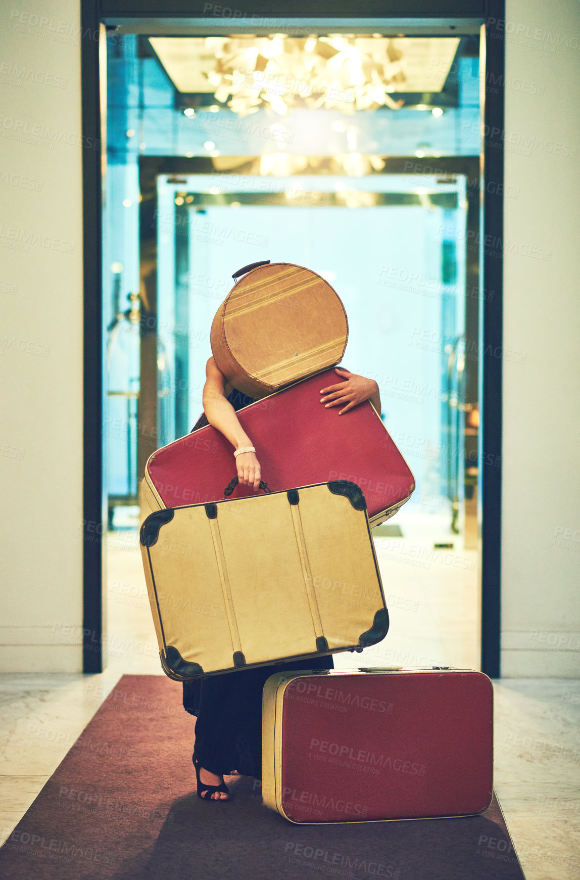 Buy stock photo Luggage, many and person with heavy baggage in hotel lobby for travel, accommodation and luxury vacation bag. Stress, overwhelmed and tourist in struggle with suitcase stack for weekend holiday