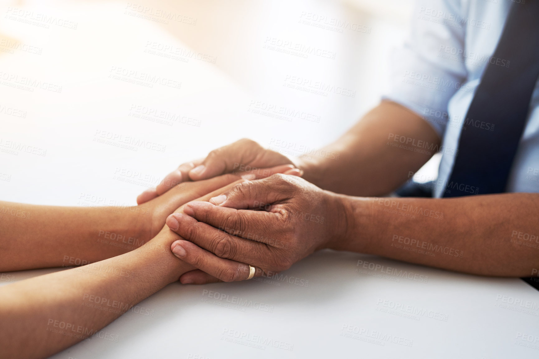 Buy stock photo Holding hands, psychologist and patient for comfort, talking or communication for bad news, diagnosis or support. Doctor, medical discussion or empathy together for care, help or wellness in hospital