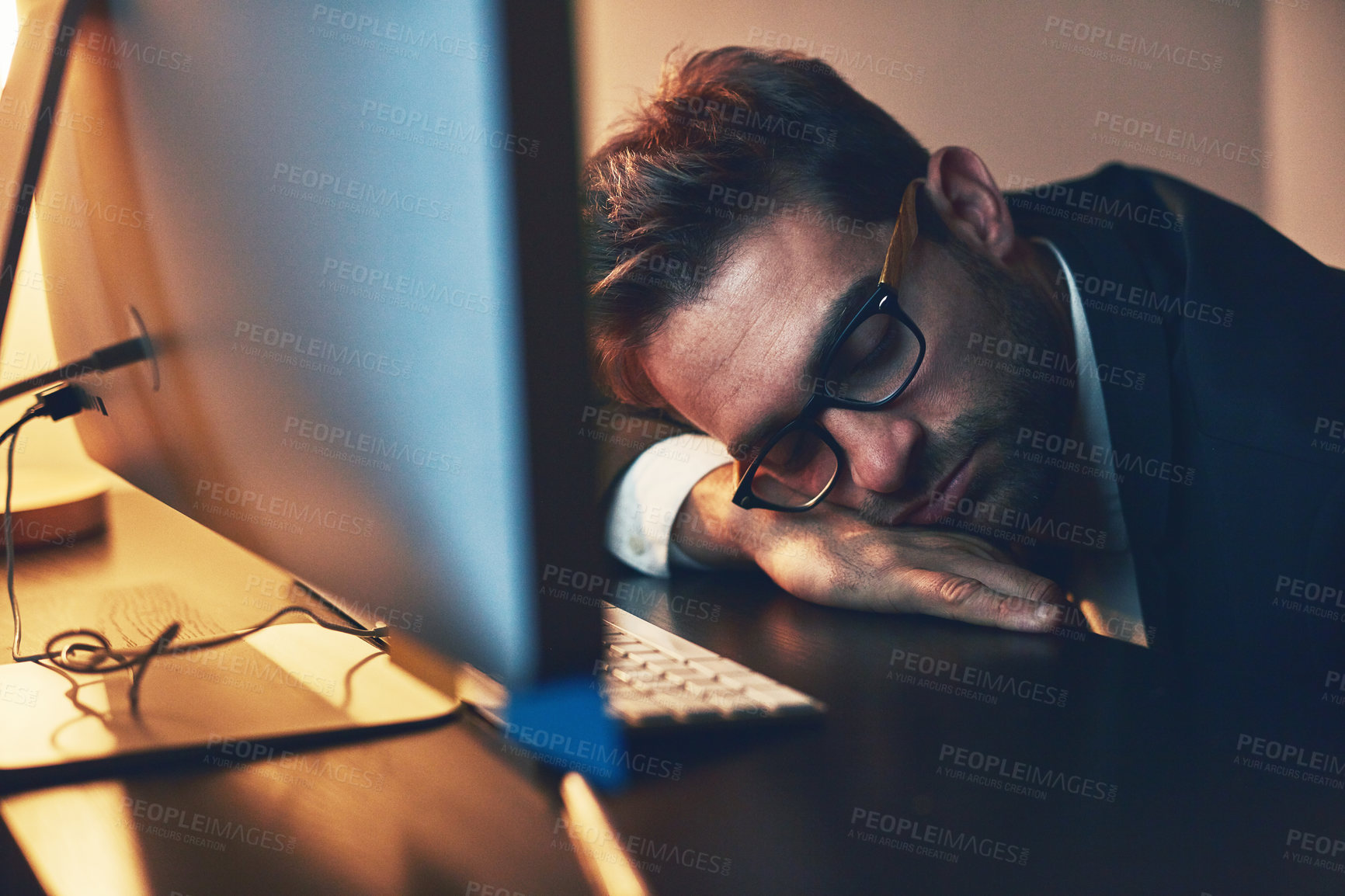 Buy stock photo Businessman, stress and sleeping in office at night, mental health and bankrupt or overwhelmed. Male person, professional and burnout in workplace, deadline and depression or mistake and dream fail