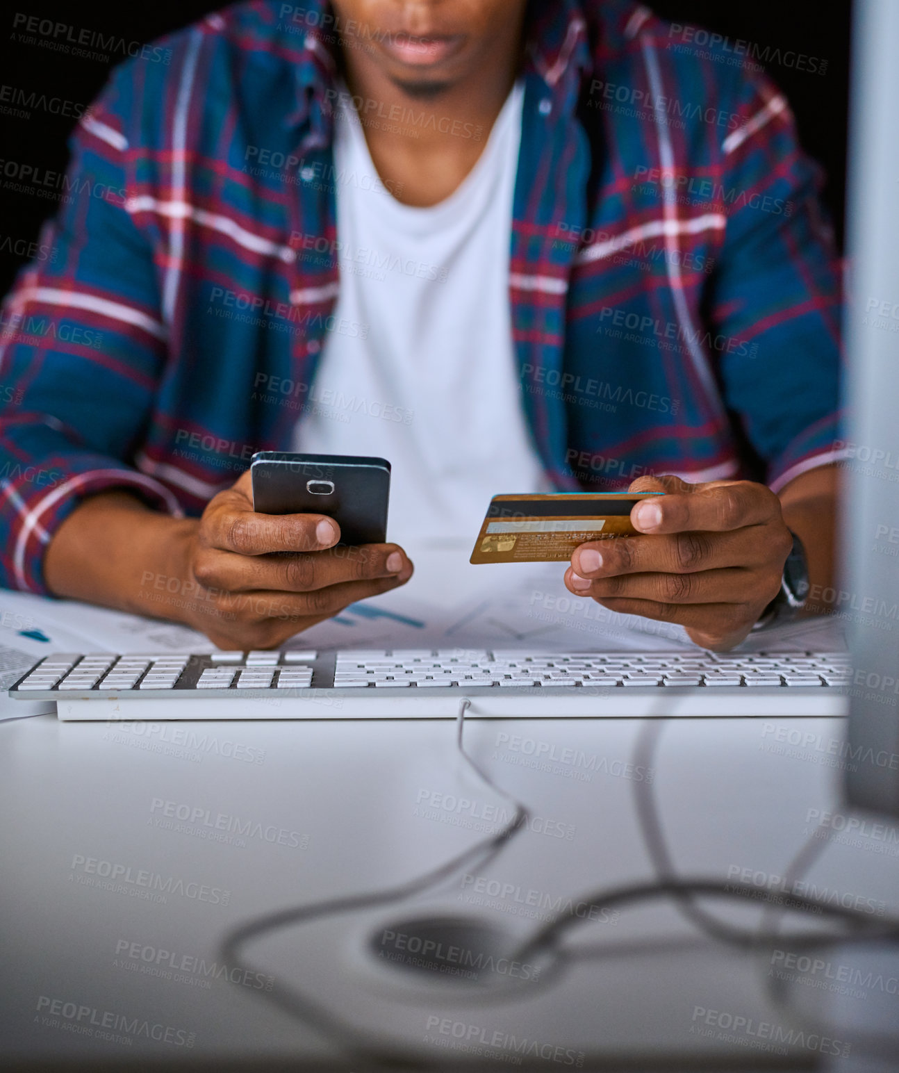 Buy stock photo Cropped shot of an unrecognizable man doing online banking using his cellphone