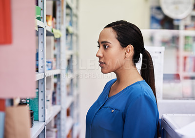 Buy stock photo Pharmacy, shopping and woman at shelf to check medical pills, price or choice of pharmaceutical drugs. Prescription medicine, decision and customer in drugstore for healthcare supplement product.