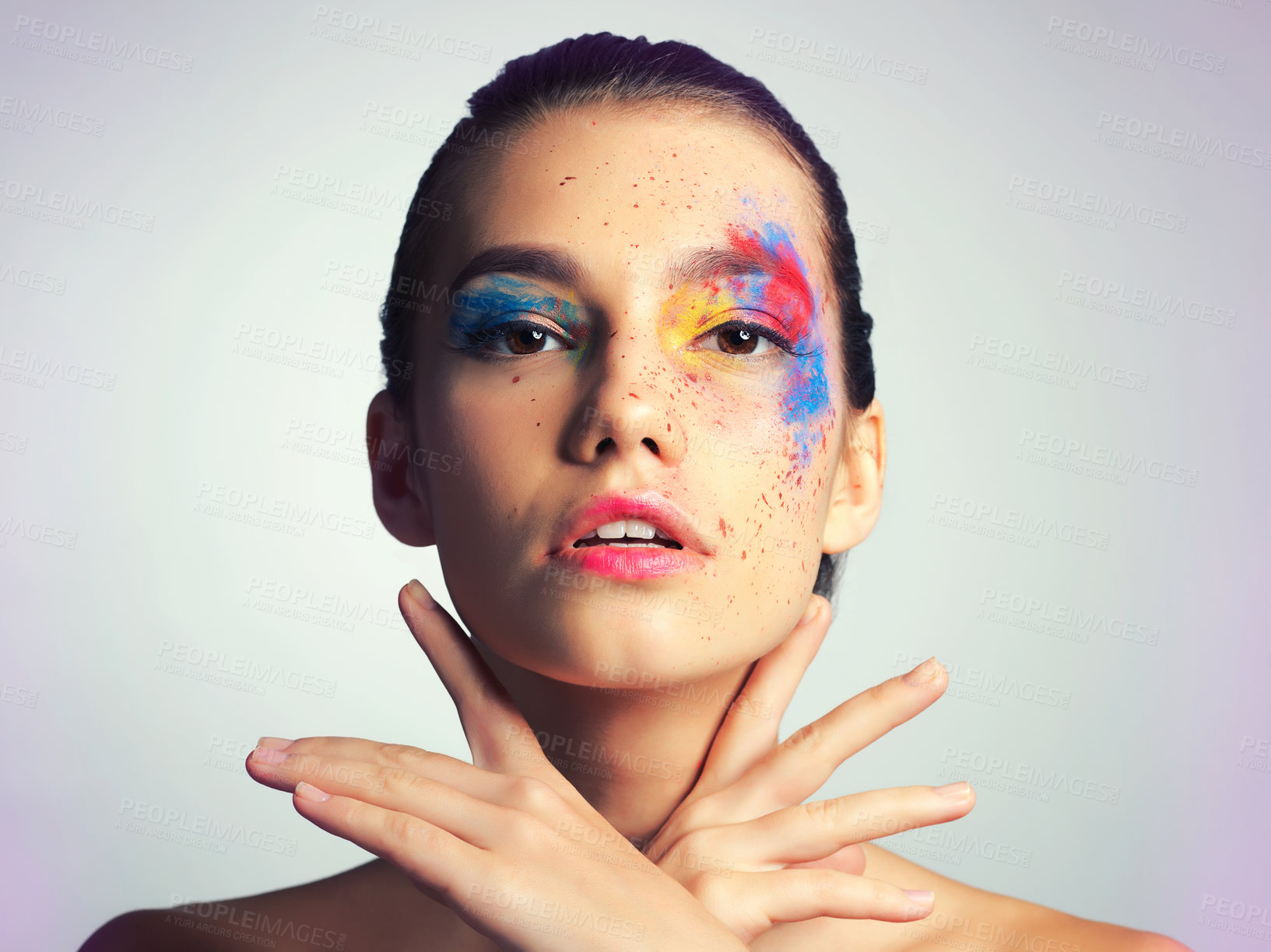 Buy stock photo Face paint, portrait and beauty of woman in cosmetics isolated on studio background. Creative, art and confident young model with color makeup for skincare, fantasy and glow of abstract aesthetic