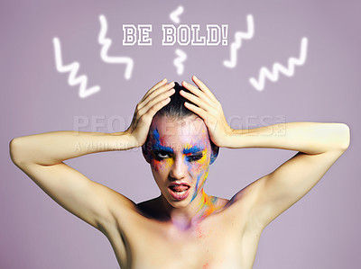 Buy stock photo Studio shot of an attractive young woman with brightly colored makeup and the words 