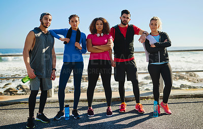 Buy stock photo Portrait of a cheerful young group of friends standing together before a fitness exercise outside during the day
