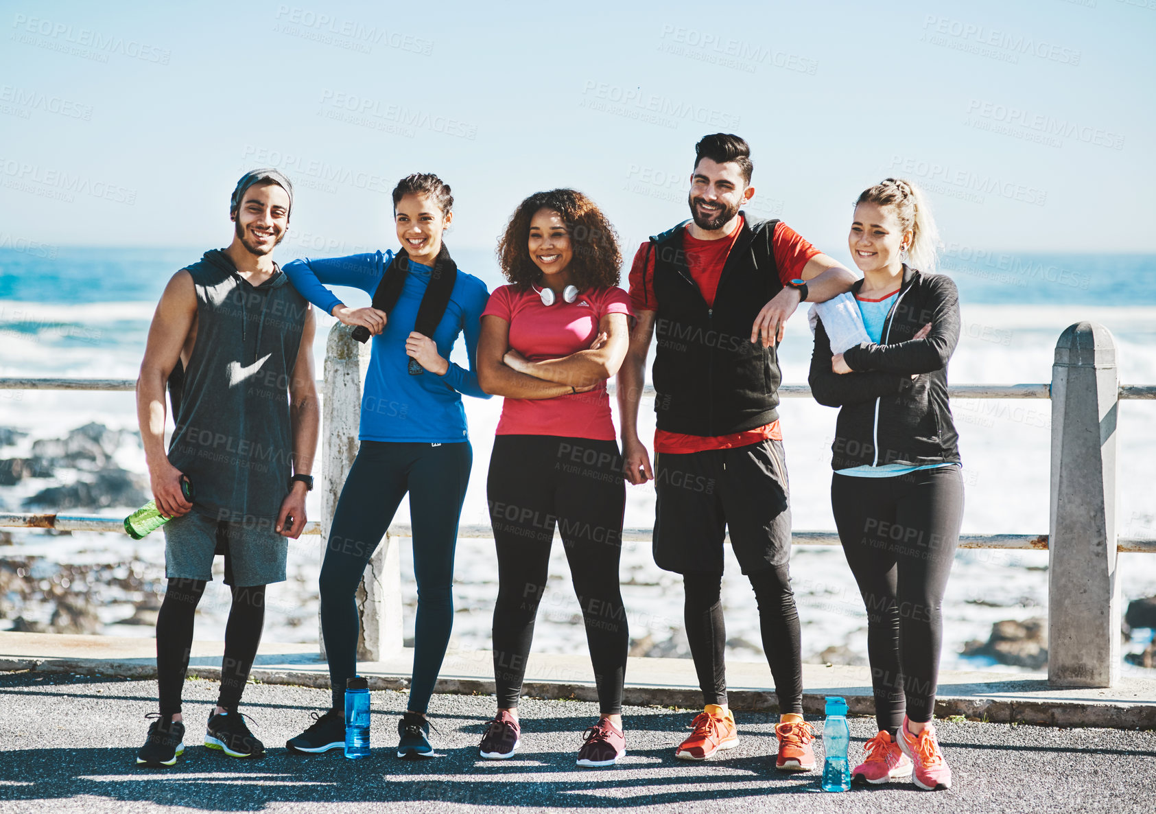 Buy stock photo Shot of a fitness group standing together while out for a run
