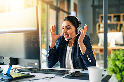 Buy stock photo Cropped shot of an attractive young female customer care agent at work in her office