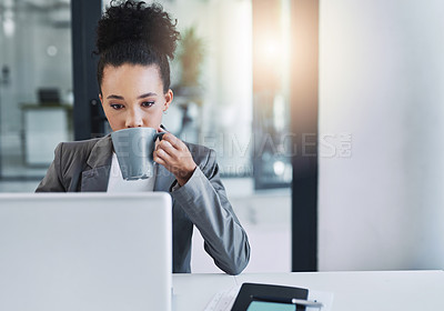 Buy stock photo Cropped shot of an attractive young businesswoman drinking a cup of coffee in her office