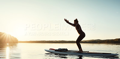 Buy stock photo Woman, yoga and ocean with sunset on boat for awareness, health and wellness in nature. Silhouette, female person or yogi in pose on paddle board for zen, fitness or outdoor exercise on mockup space