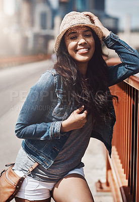 Buy stock photo Shot of a beautiful young woman spending her day in the city