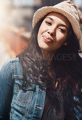 Buy stock photo Shot of a beautiful young woman spending her day in the city