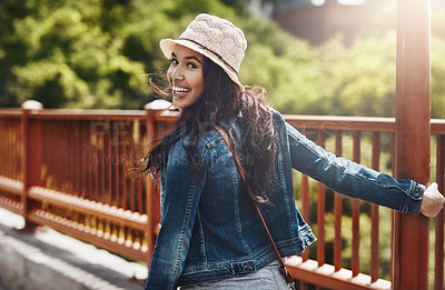 Buy stock photo Shot of a beautiful young woman spending her day in the city