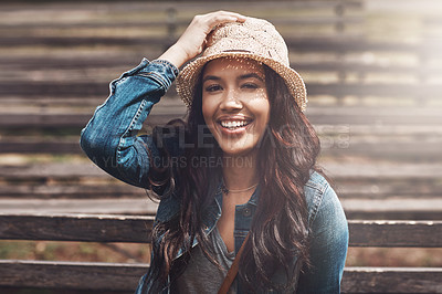 Buy stock photo Portrait of an attractive young woman spending a day in the park