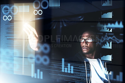 Buy stock photo Cropped shot of a young male hacker cracking a computer code in the dark