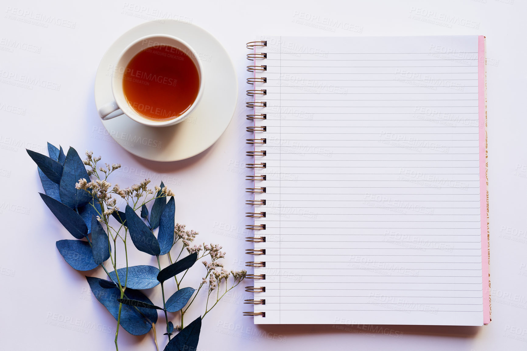 Buy stock photo Top view, diary and tea for writing on desk, flowers and sustainable paper for gratitude journal. Notepad, blank memo and beverage for planning or inspiration, idea drink and book for creativity