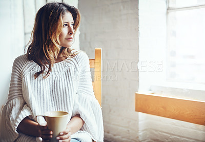 Buy stock photo Relax, thinking and woman drinking coffee in her home, content and quiet while daydreaming on wall background. Tea, comfort and calm female enjoying peaceful morning indoors while looking out window