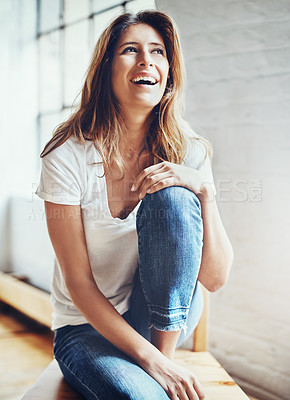 Buy stock photo Woman, happy and laughing to relax at house with funny joke for comfort, carefree and gratitude for peace. Smile, female person and cheerful for comedy, weekend and freedom in living room at home