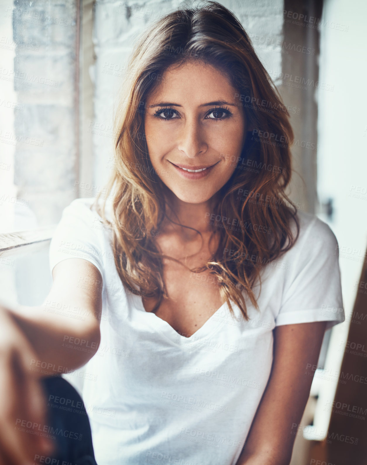 Buy stock photo Portrait of an attractive young woman relaxing at home