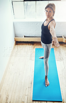 Buy stock photo Portrait of an attractive young woman practising yoga at home