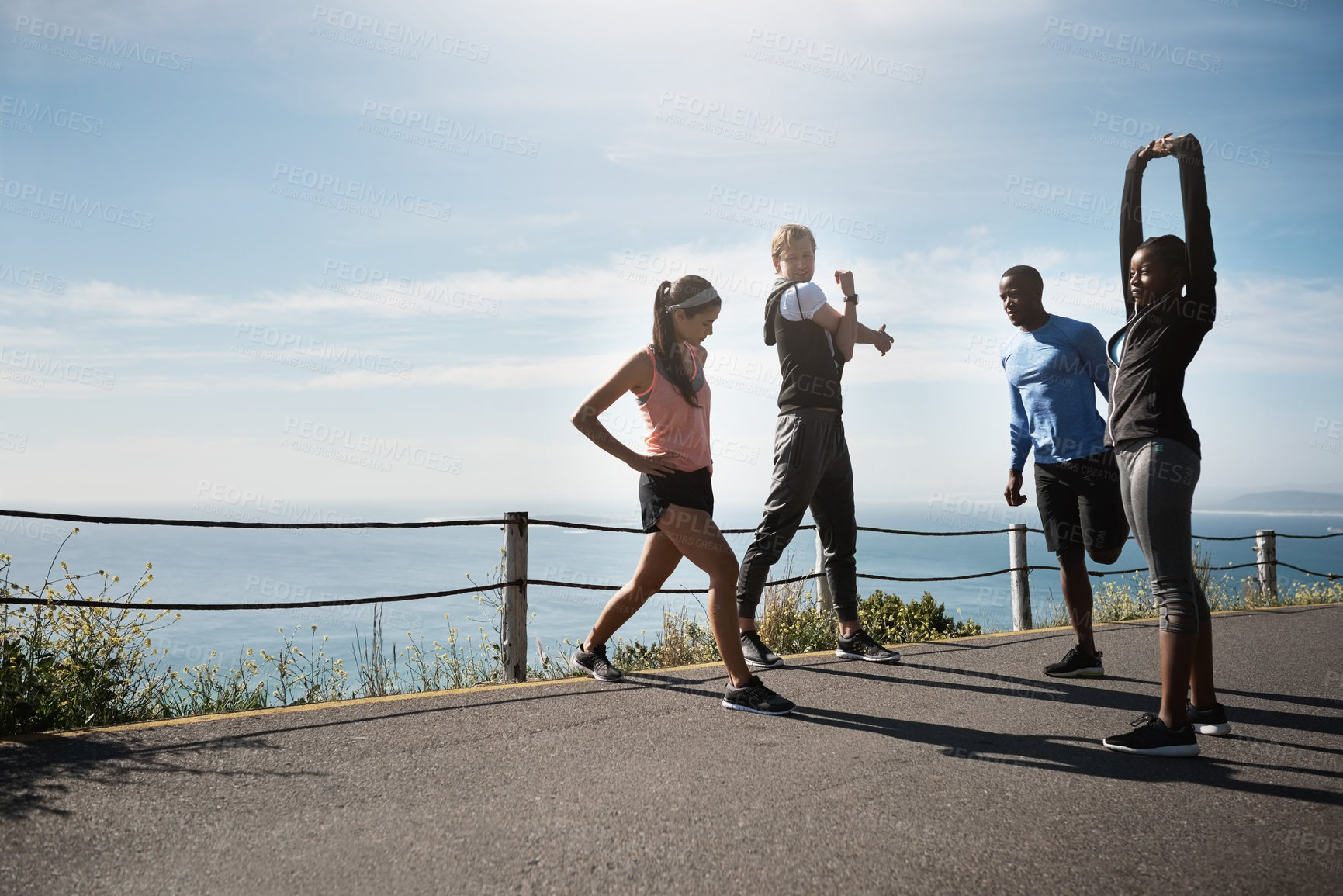 Buy stock photo People, outside and stretching on road for fitness with running for exercise and workout. Friends, outdoor and committed or active in sportswear with warm up for health, wellbeing and self care