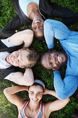 Buy stock photo Exercise, above and smile of people on grass for outdoor training break, support and teamwork. Diversity, happy friends and relax in circle by nature for fitness, collaboration and rest in workout