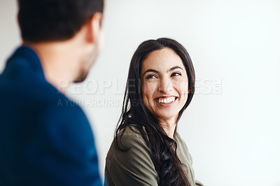 Buy stock photo Cropped shot of two young businesspeople working together  in a modern office