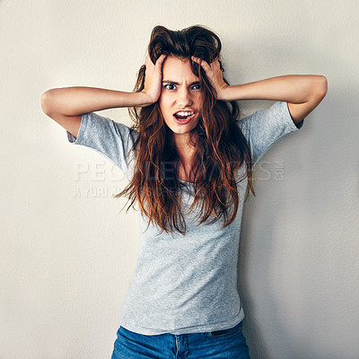 Buy stock photo Mental health, anxiety and portrait of woman with hair pulling, anger and identity crisis for gen z student. Burnout, stress and frustrated girl with depression, hands on head and white background