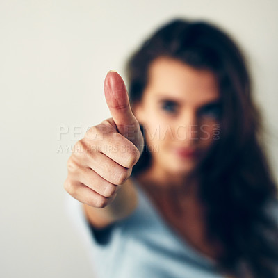 Buy stock photo Hand, thumbs up and yes with woman in studio, closeup for like, motivation or success of winner. Emoji, gesture of support and vote with confident person showing sign for deal, review or social media