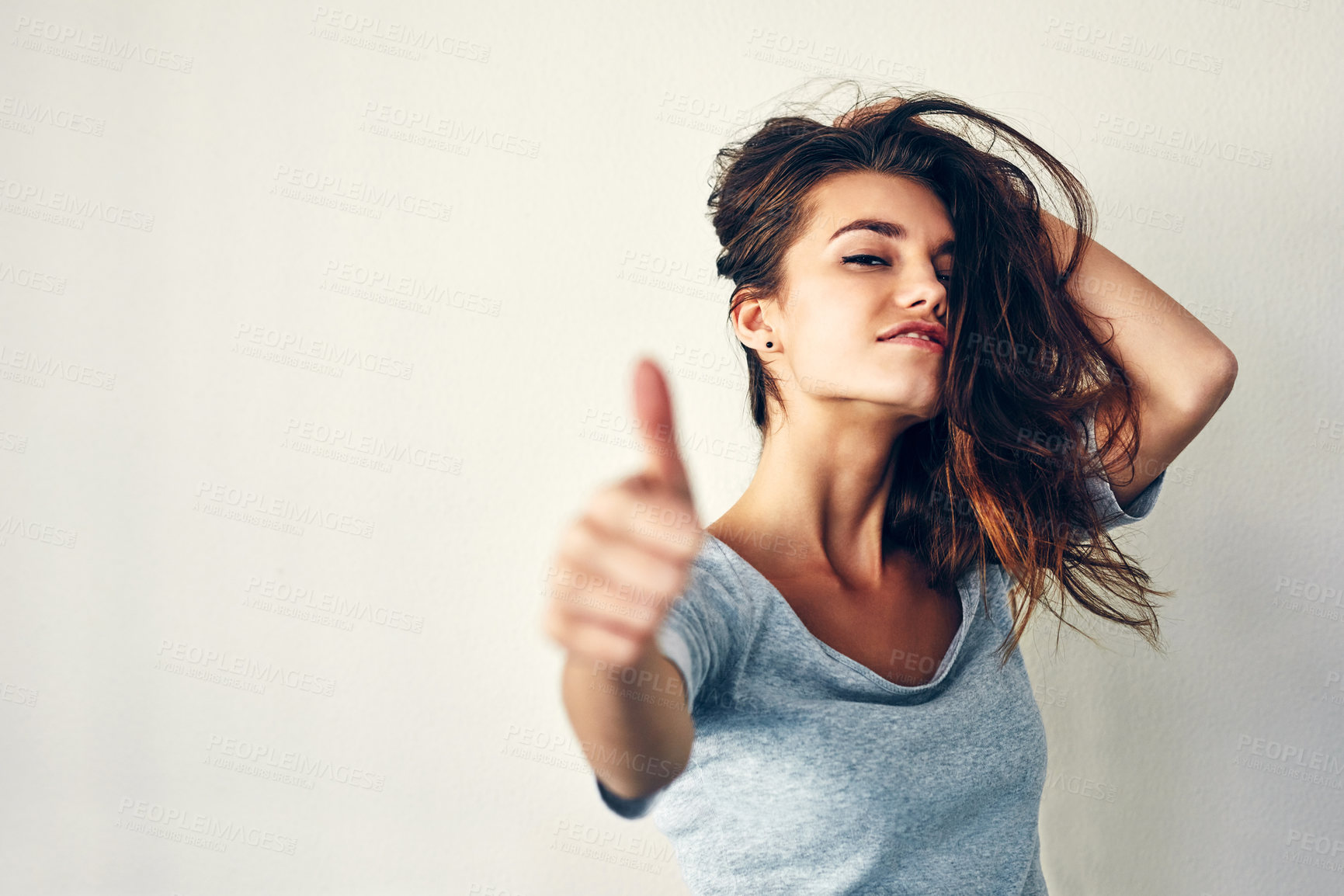 Buy stock photo Woman, funky and thumbs up for haircare in white background with treatment for hygiene, clean and fresh. Female person, portrait and yes or agree for routine, results and natural with mockup space