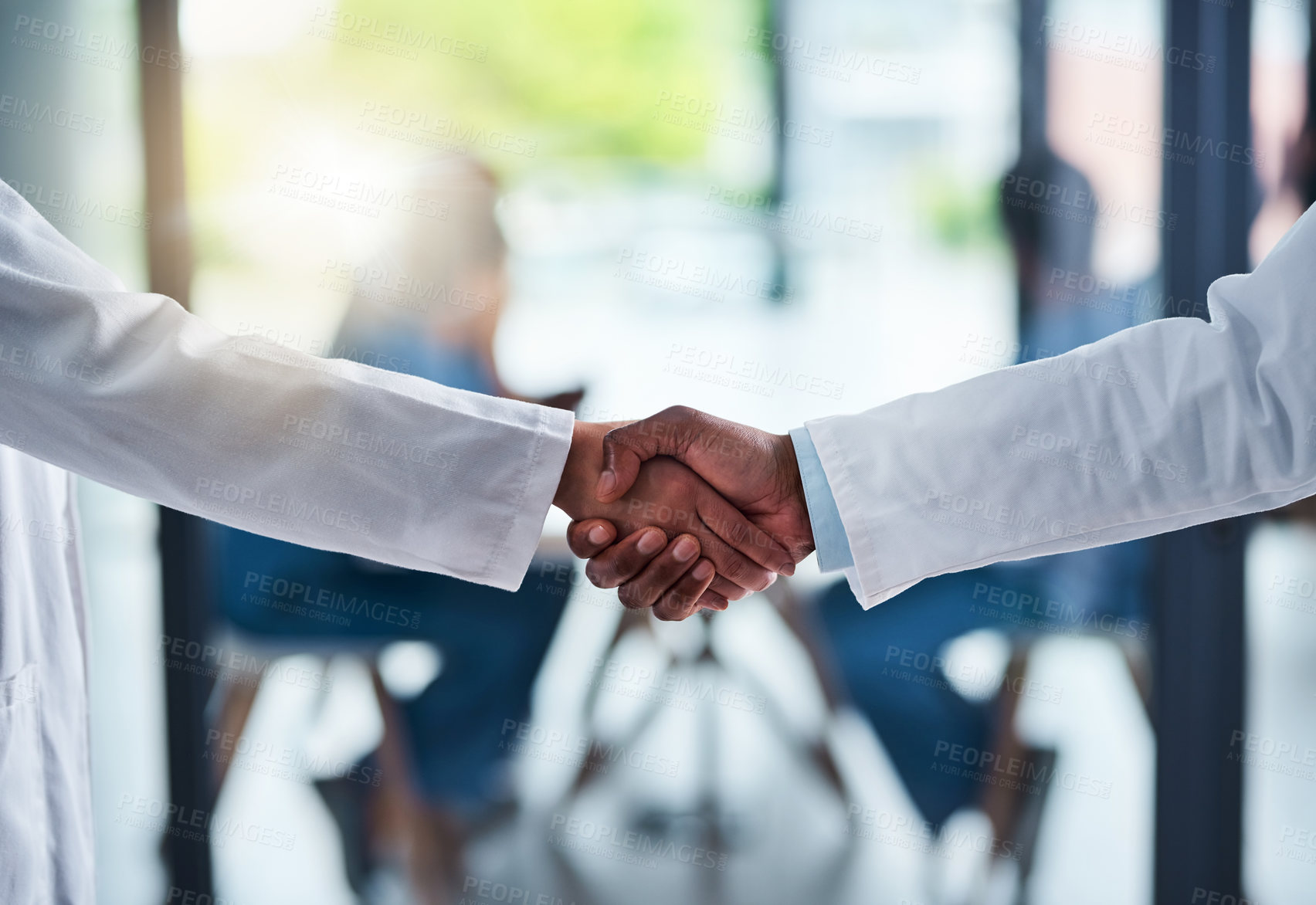 Buy stock photo People, medical and doctors handshake in hospital, medicine and wellness with healthcare professional. Trust, support and shaking hands for partnership or clinic collaboration, thank you and welcome