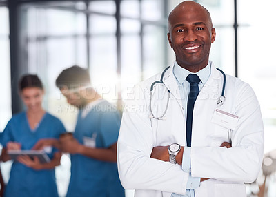 Buy stock photo Doctor, leader and portrait of man in hospital, healthcare and clinic for medical experience, expert trust and quality care. Black person, medicine and happy surgeon with arms crossed for confidence