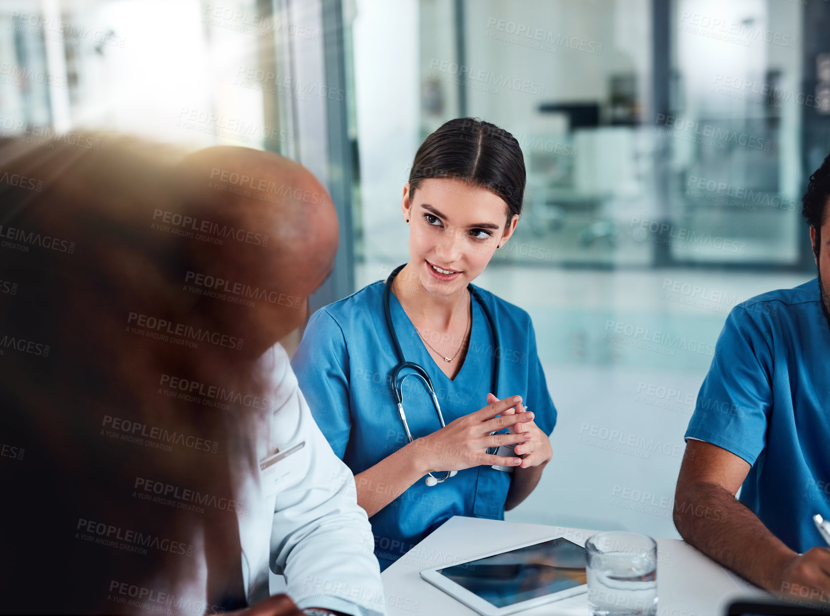 Buy stock photo Discussion, doctor and meeting with nurses, tablet and  medical strategy for diagnosis and treatment. Diversity, collaboration and healthcare for consulting, planning or surgery results in hospital