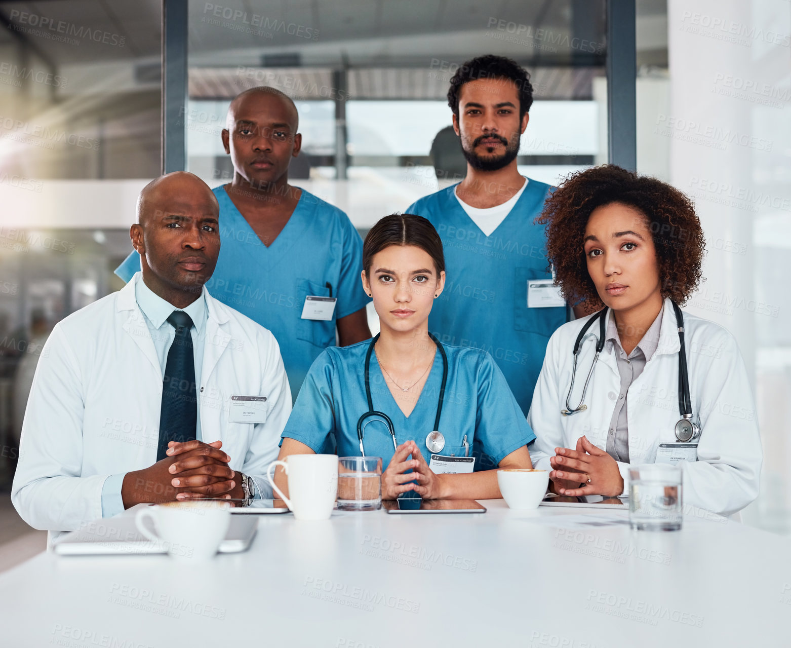 Buy stock photo Medical, meeting or portrait of doctors and nurses in hospital together for collaboration or planning. About us, diversity or proud with serious man and woman healthcare team in clinic for consulting