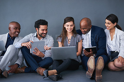 Buy stock photo Business, employee and happy with laptop in studio on grey background for teamwork and collaboration. People, diversity and smile with technology for research, prepare and online search for project