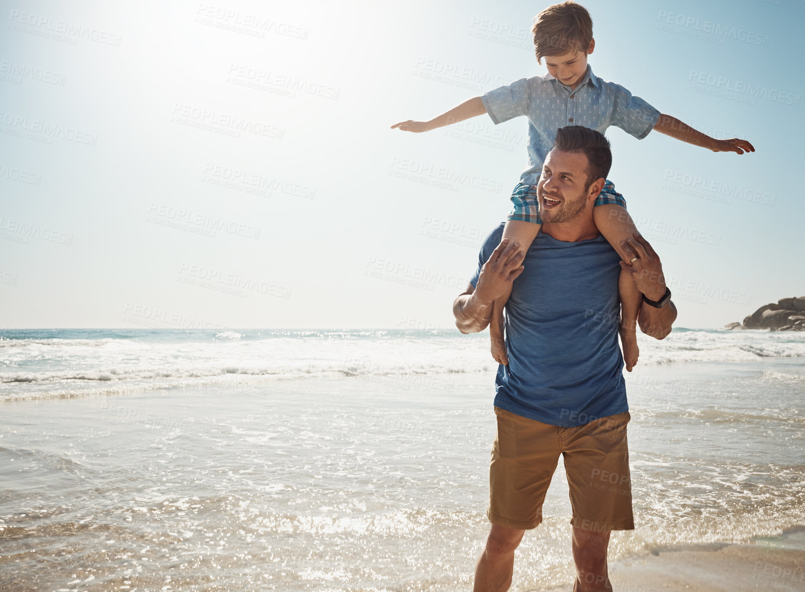 Buy stock photo Father, beach and boy on shoulders for airplane, vacation or waves to relax with care, love or bonding on walk. Man, dad and child for family, plane or flight by sea for mockup space in Croatia